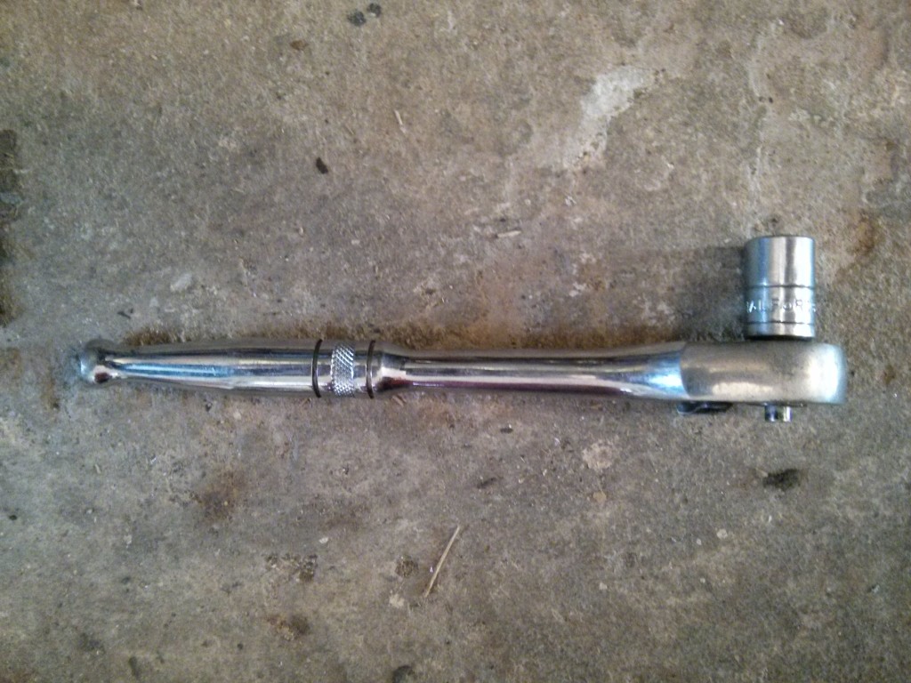 This works for top row bolts (3/8 inch drive to 12mm socket)